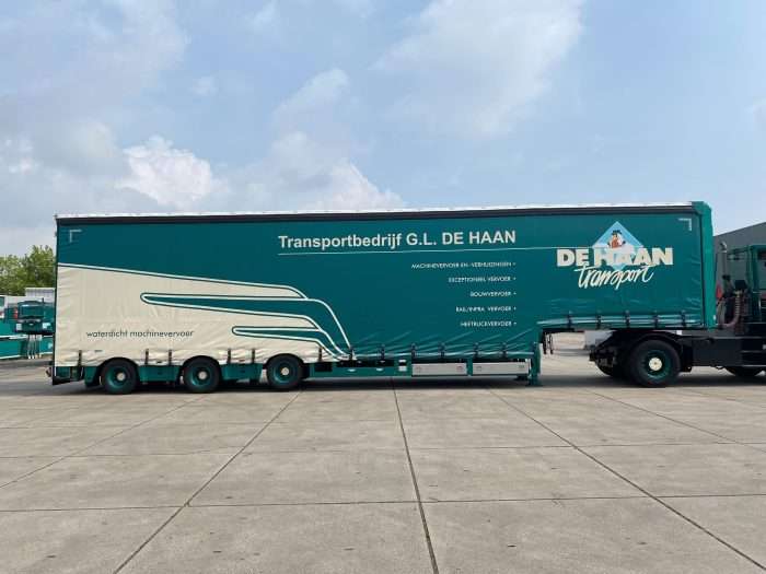 3-assige-semidieplader-huifgesloten-heftrucktrailer-9-tons-laadklep